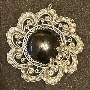 Elegant Silver-tone and Black Floral Pendant